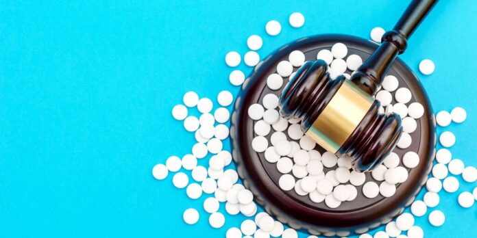 Pills-Gavel-shutterstock_1124607062-16x9-1-gID_7.jpg
